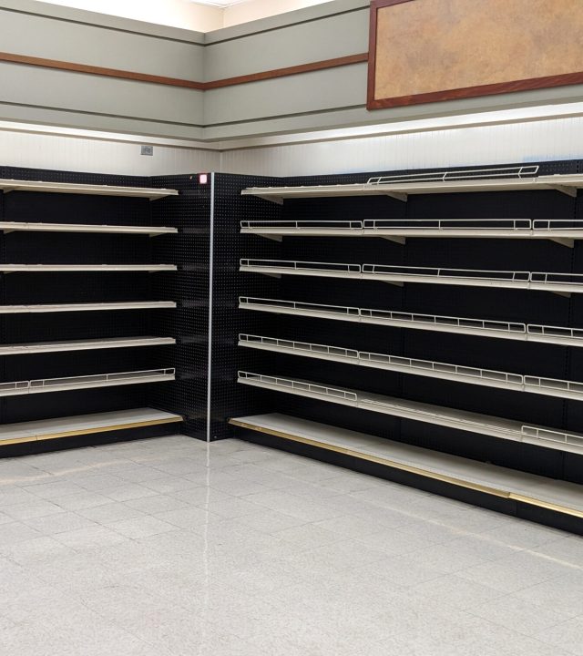 vacant shelves in a store vacant shelves in a store